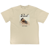 The BOSK Moving Tee is an Off White, classic fit t-shirt featuring a dung beetle graphic on sand with "Bosh" above and “KEEP IT MOVING.” below, all printed on premium heavy-weight cotton.